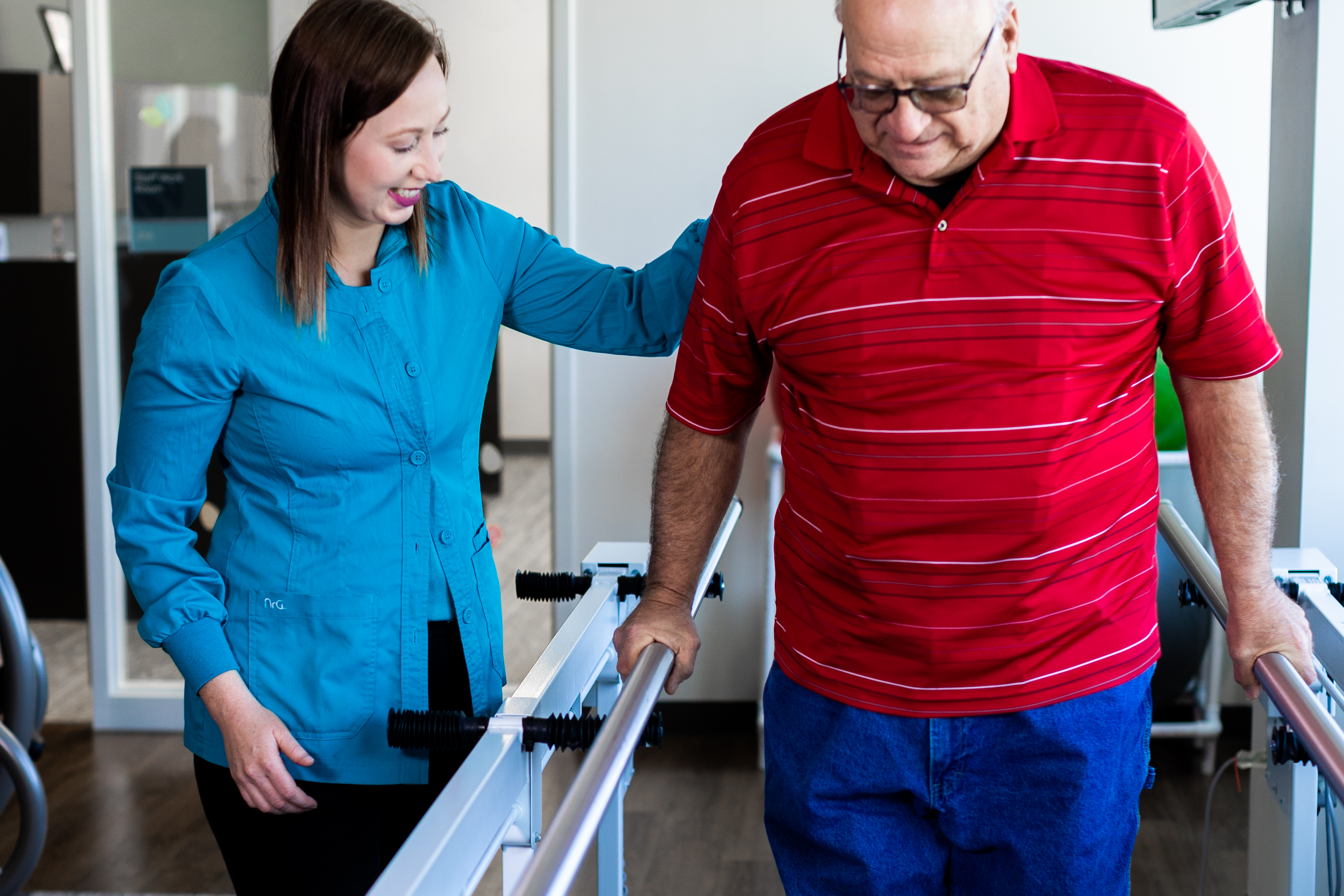 Healthcare professional assisting patient in rehab care protocol
