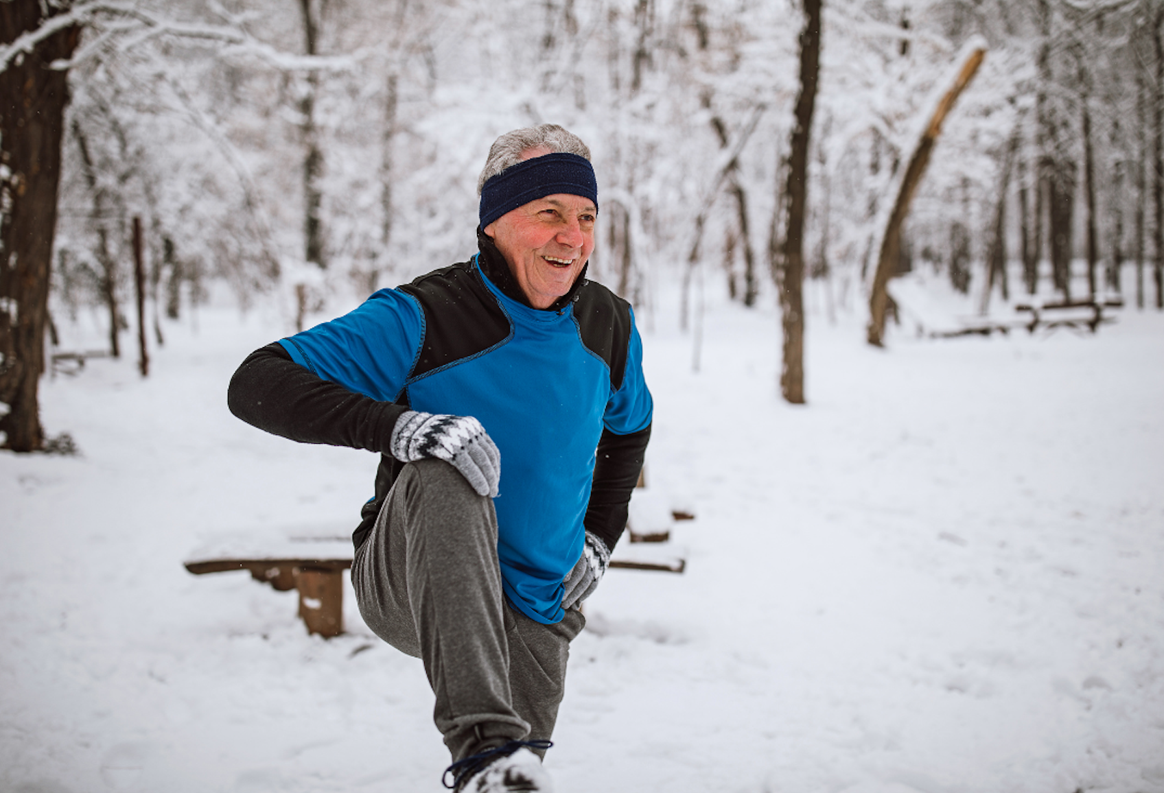 Man stretching in winter