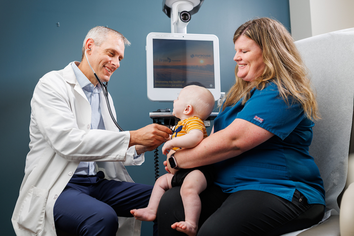 doctor caring for baby