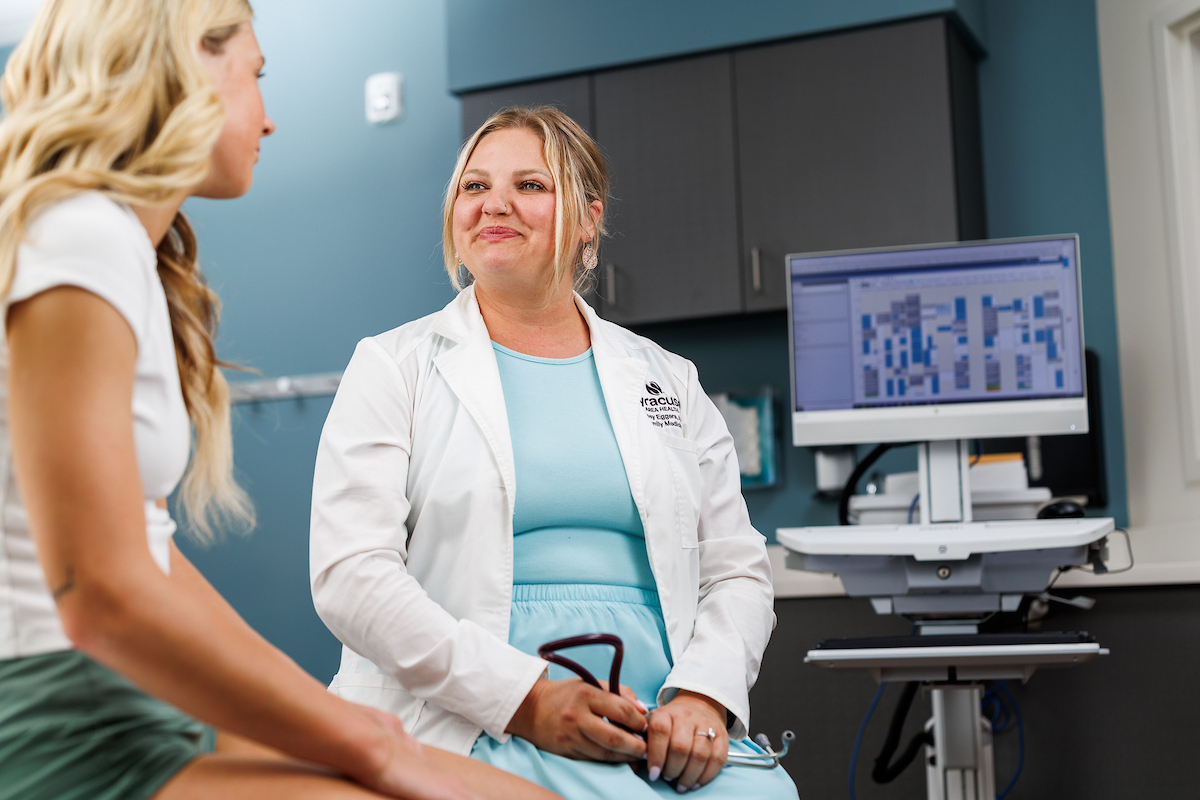 Women working with Doctor 