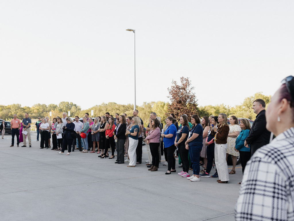 Crowd Celebrating Sagewell Ribbon Cutting